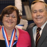Former Music Director Richard Floyd (pictured left) and current Music Director Dr. Brad Kent honored Patty Esfandiari at the 2014 State Marching Band Contest at the Alamodome.