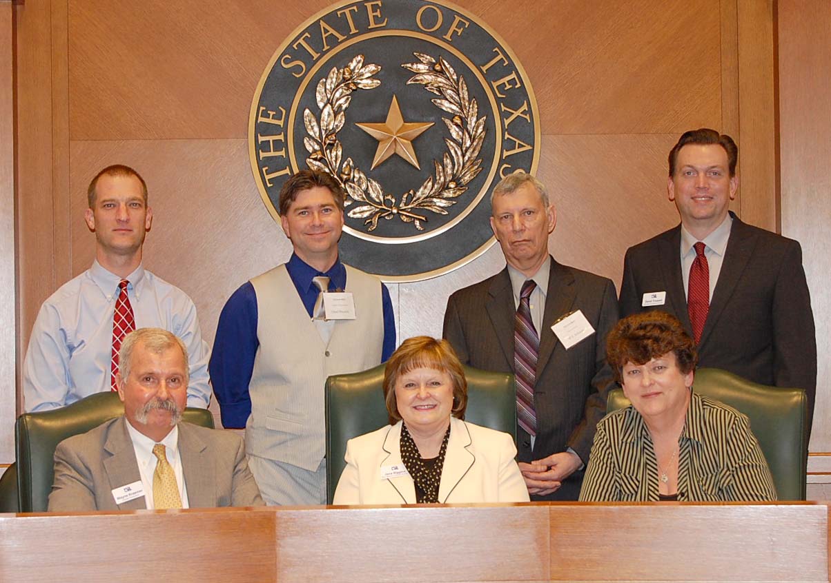 The 1A-3A tab room staff: (seated) Wayne Kraemer from Texas State University, Jana Riggins, Speech and Debate Director, Cindi Havron from Magnolia HS (standing) Jeremy Hutchins from Texas State University, Chad Filsowski from Calhoun HS, Bill Schuetz from Gregory-Portland HS and David Trussell, UIL A+ Director 
