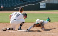 Wichita Falls Rider first baseman Ben Smith attempts to tag Jesse Baker from Brenham High School in the 4A semifinal game at the UIL State Baseball Tournament at the Dell Diamond in Round Rock. The Rider Raiders won the game 3-1. Last year at the State Tournament, the Brenham Cubs defeated the Raiders in the semifinal game and went on to win the 2010 4A Championship.