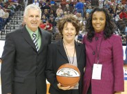 Granbury girls' basketball Coach Leta Andrews stands with UIL Executive Director Charles Breithaupt and Assistant Athletic Director Sheila Henderson at the 2011 State Basketball Tournament. Andrews was honored for her record at the girls' tournament.