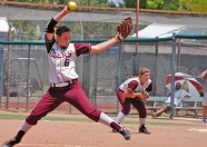 The Dripping Springs HS Varsity Softball pitcher delivers a pitch during the semifinal game at the 2011 UIL State Softball Tournament. 
