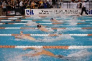 Swimmers compete at the 2011 UIL State Swimming and Diving Meet.