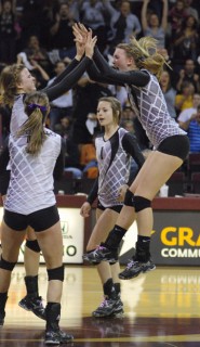 The Water Valley High School Lady Wildcats celebrate the win over Iola High School in the 1A State Volleyball Championship game. The Lady Wildcats won the match in three games.